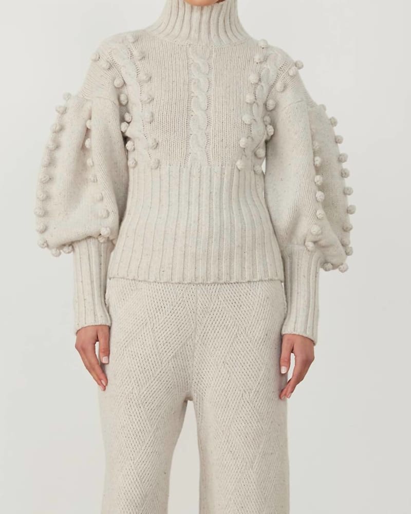 Front of a model wearing a size L Eva Wool Knit Sweater in Heather Dot Marle in Heather Dot Marle by JOSLIN. | dia_product_style_image_id:343573